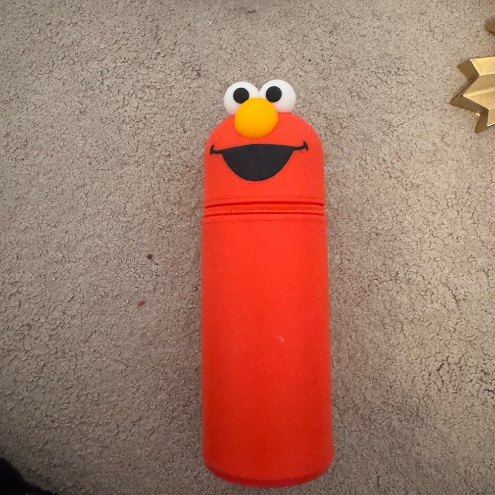 Red Elmo makeup brush holder